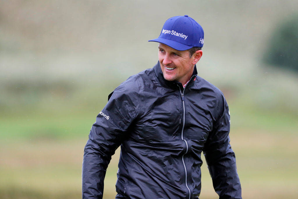 Justin Rose smiling rain